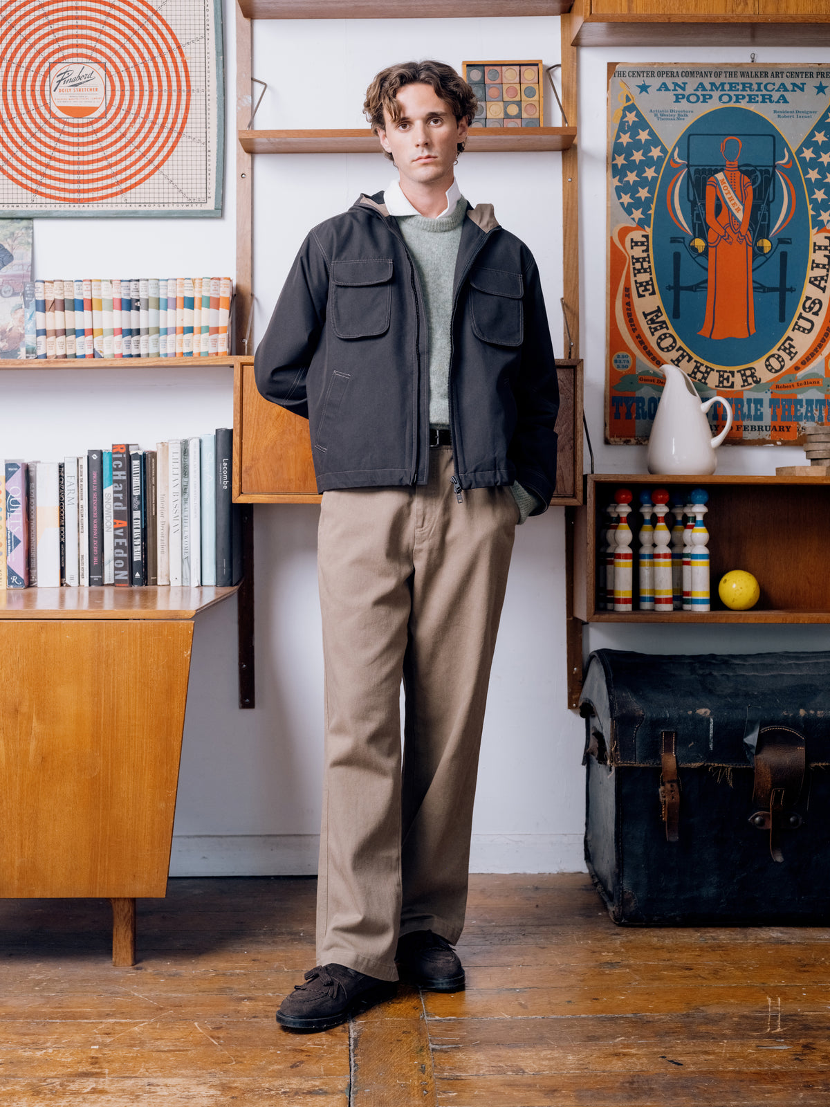 Graphite Saltash jacket over a pale green jumper with beige trousers and brown suede shoes.