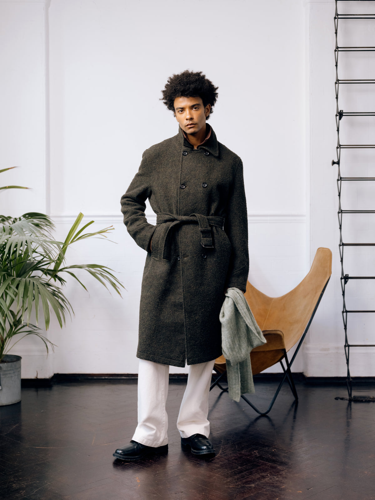 Dark green Big Coat belted over cream trousers and black Gibson shoes.